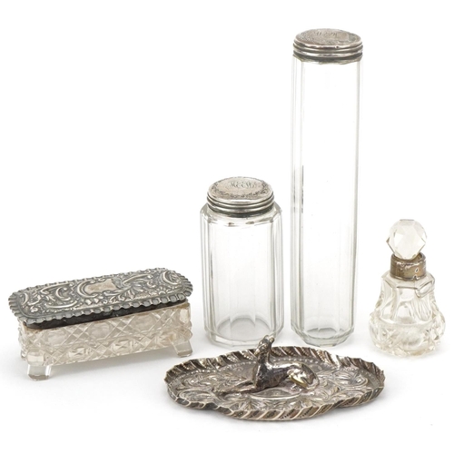 469 - Four Victorian and later cut glass jars with silver lids and a silver dish mounted with a white meta... 