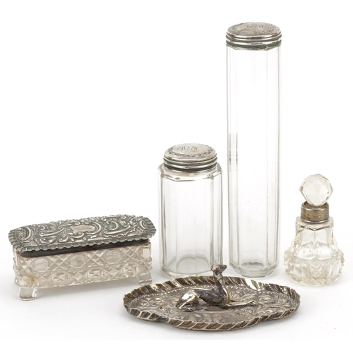 469 - Four Victorian and later cut glass jars with silver lids and a silver dish mounted with a white meta... 