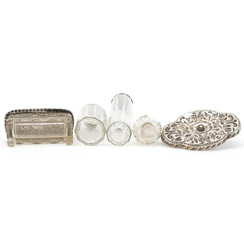 469 - Four Victorian and later cut glass jars with silver lids and a silver dish mounted with a white meta... 