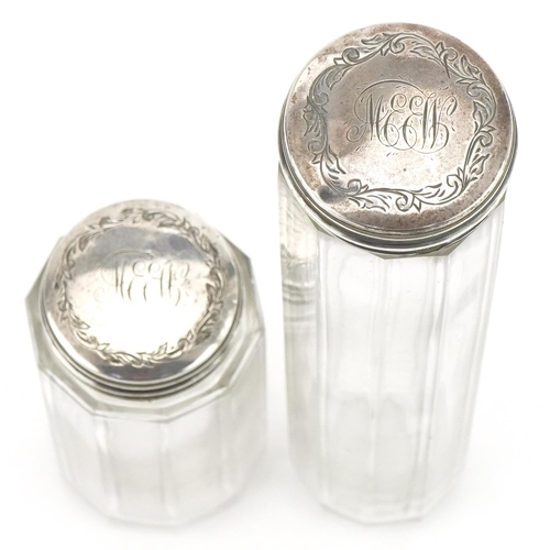 469 - Four Victorian and later cut glass jars with silver lids and a silver dish mounted with a white meta... 