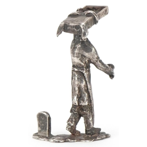 434 - Thomas Charles Jarvis, Elizabeth II silver study of a market seller, London 1979, 7cm high, 63.6g