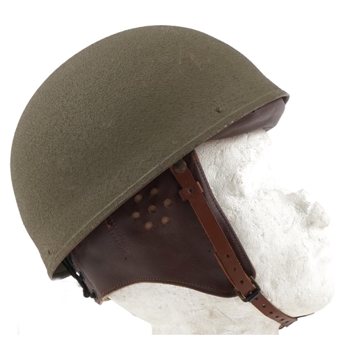 2629 - British military World War II tin helmet with liner