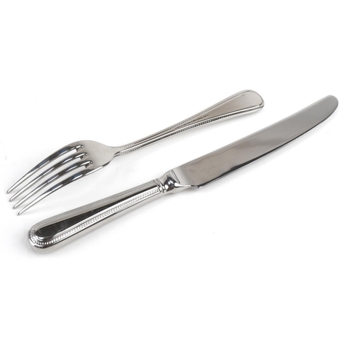 535 - Arthur Price International six place canteen of stainless steel cutlery, 40cm wide