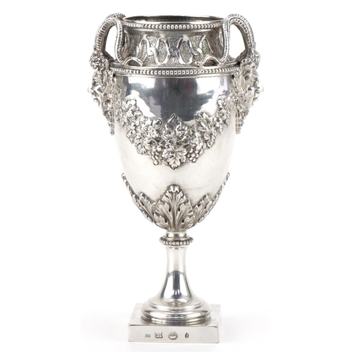  German Hanau silver vase relief decorated with devil heads and embossed with fruit and vines, 16cm h... 