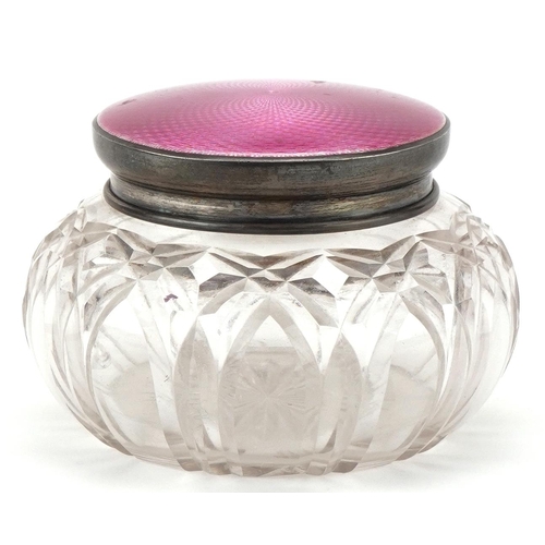 426 - Henry Matthews, George V cut glass powder jar with silver pink guilloche enamel lid, 12cm in diamete... 