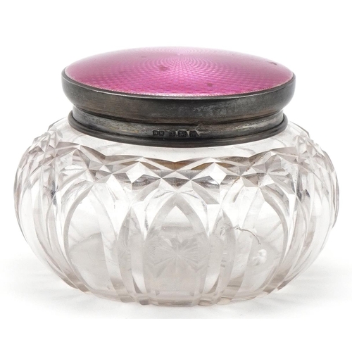 426 - Henry Matthews, George V cut glass powder jar with silver pink guilloche enamel lid, 12cm in diamete... 