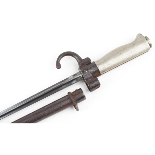 2742 - French military 1886 bayonet with cross blade and scabbard, 65cm in length