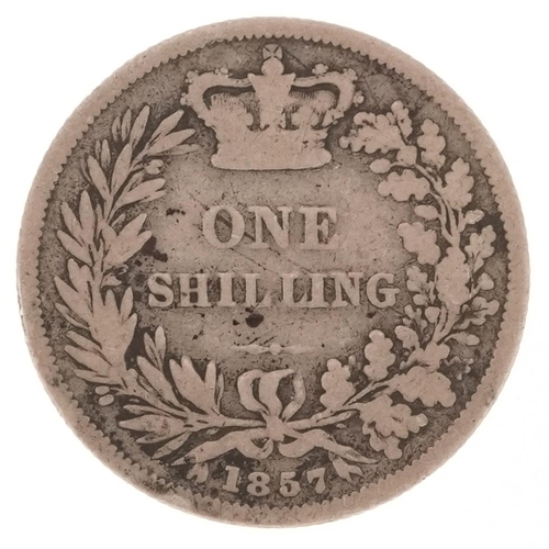 2105 - Queen Victoria 1857 silver shilling with error on the obverse side of the coin, F. with inverted G b... 