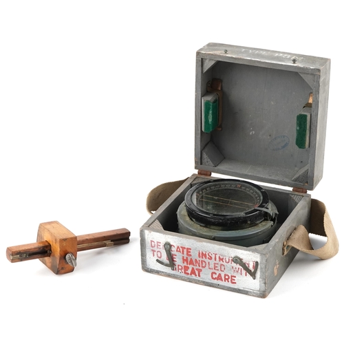 2623 - Military interest Spitfire/Hurricane compass with case and a marking gauge with impressed marks, the... 