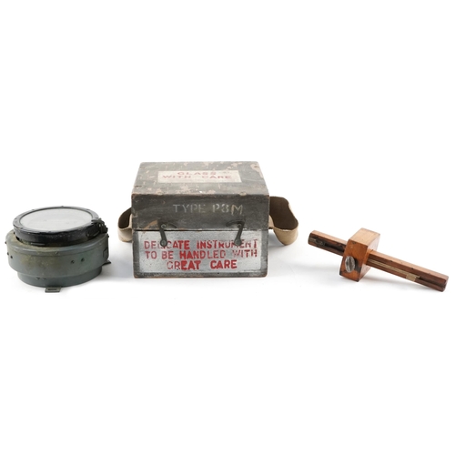 2623 - Military interest Spitfire/Hurricane compass with case and a marking gauge with impressed marks, the... 