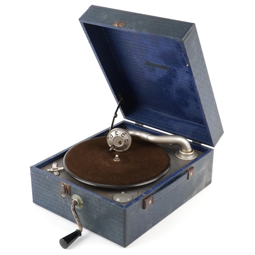 627 - Vintage Brunswick portable record player within a blue case together with four records