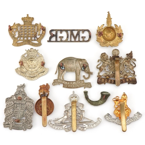 2564 - Eleven military interest cap badges including GMGR, Military Foot Police and Royal Gloucestershire H... 