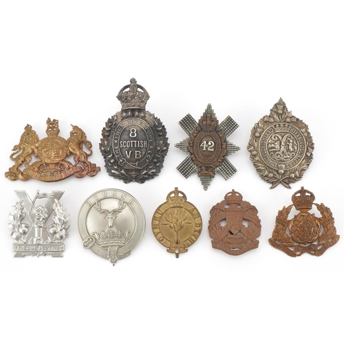 2563 - Nine military interest cap badges including The King's Liverpool Regiment, 1st Argyll Highland Rifle... 