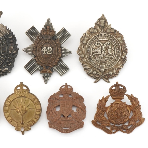 2563 - Nine military interest cap badges including The King's Liverpool Regiment, 1st Argyll Highland Rifle... 