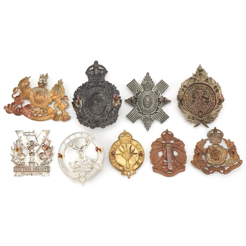 2563 - Nine military interest cap badges including The King's Liverpool Regiment, 1st Argyll Highland Rifle... 