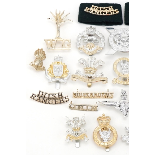 2549 - Collection of military interest cap badges including Irish Rangers, Royal Anglian and The Royal Huss... 