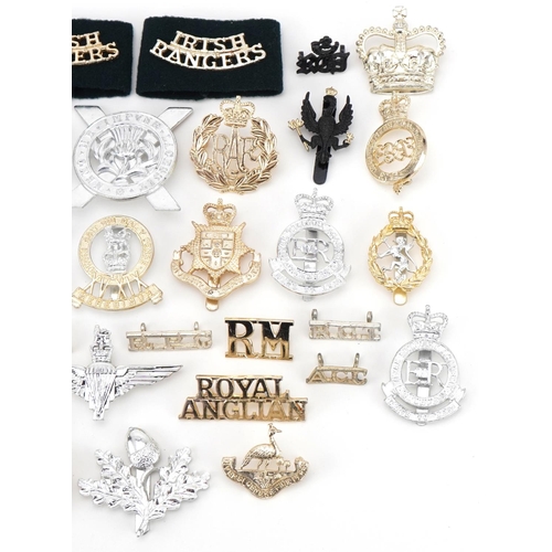 2549 - Collection of military interest cap badges including Irish Rangers, Royal Anglian and The Royal Huss... 