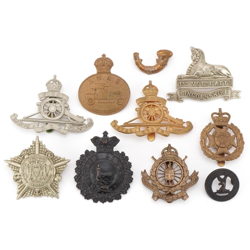 2560 - Ten military interest cap badges including 1st Voluntary Battalion Lincolnshire, West Riding Royal H... 