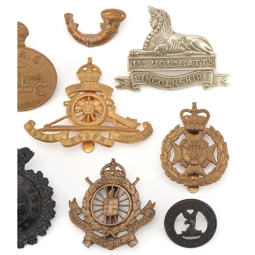 2560 - Ten military interest cap badges including 1st Voluntary Battalion Lincolnshire, West Riding Royal H... 