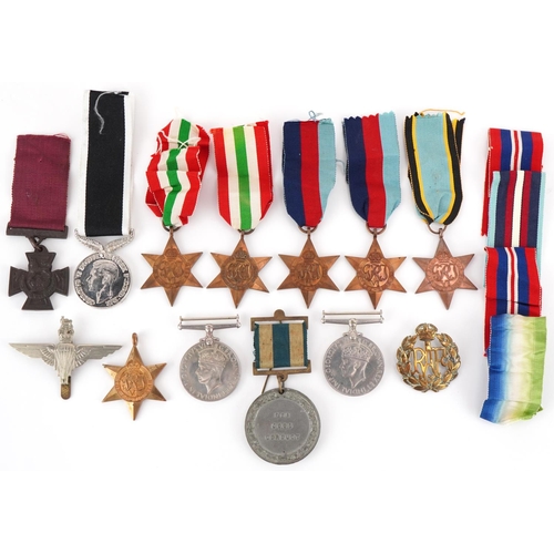 2521 - Militaria including British World War II medals and and RAF cap badge