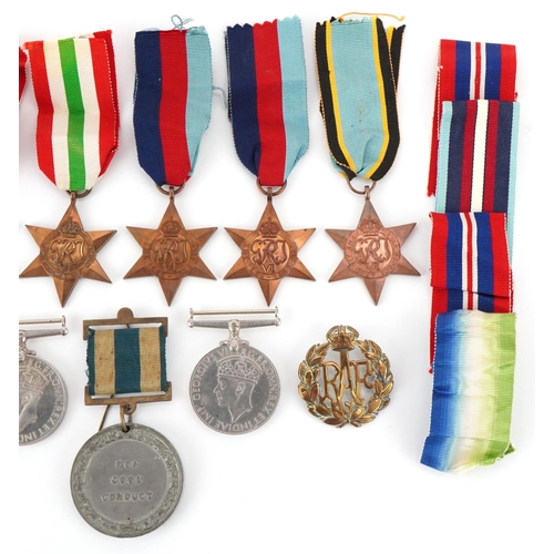 2521 - Militaria including British World War II medals and and RAF cap badge