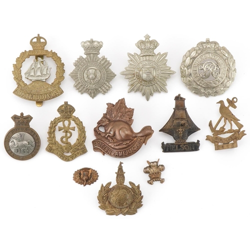 2562 - Twelve military interest cap badges including British American, Duke of Edinburg's Own Volunteer Rif... 