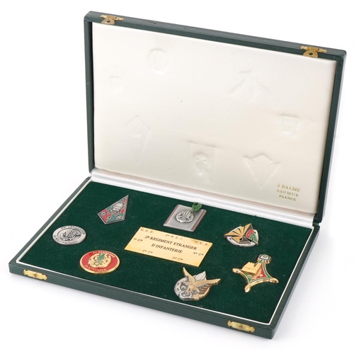 2569 - French military Foreign Legion 2nd Regiment set of seven badges housed in a fitted case