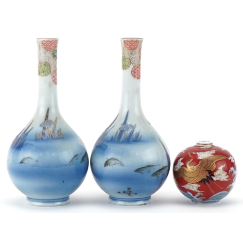 210 - Pair of small 20th century Japanese Fukagowa bottleneck vases, each decorated with fish and flowers,... 