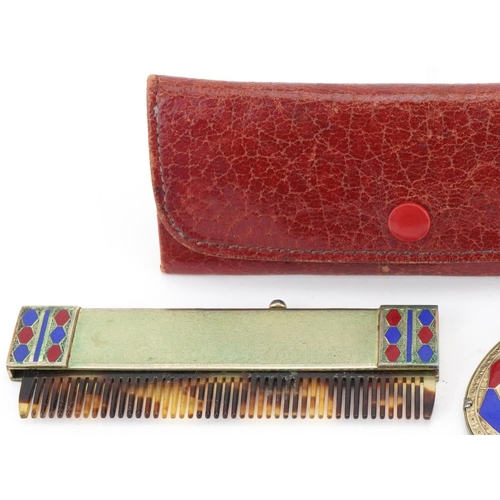 76 - 20th century German travelling vanity set including mirror and comb together with two enamelled cap ... 