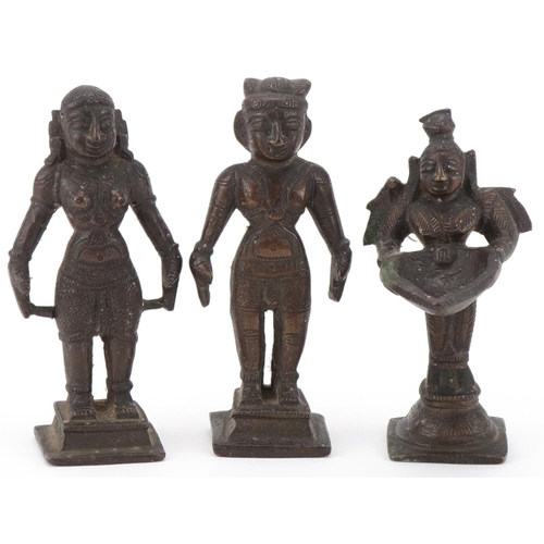 91 - Three 20th century Indian cast bronze statues of deities, 11cm high