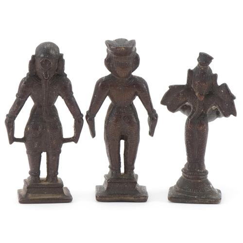 91 - Three 20th century Indian cast bronze statues of deities, 11cm high