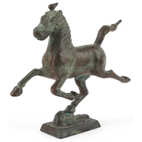 1157 - Chinese patinated bronze study of a Tang horse, 19cm in length