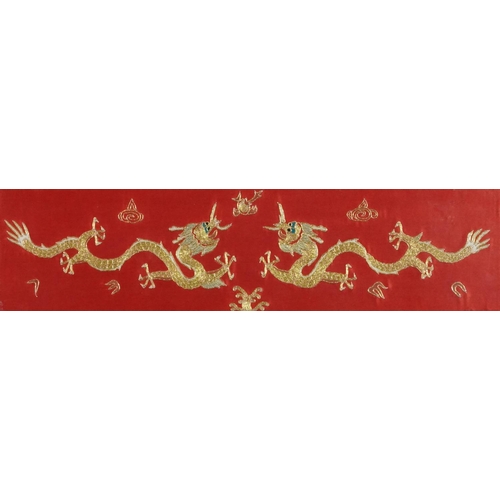 395 - Late 20th century Chinese embroidered panel decorated with two dragons in gold thread, framed and gl... 