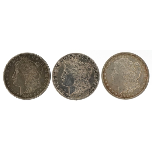 2142 - Three American silver Morgan dollars dates 1883, 1885 and 1890