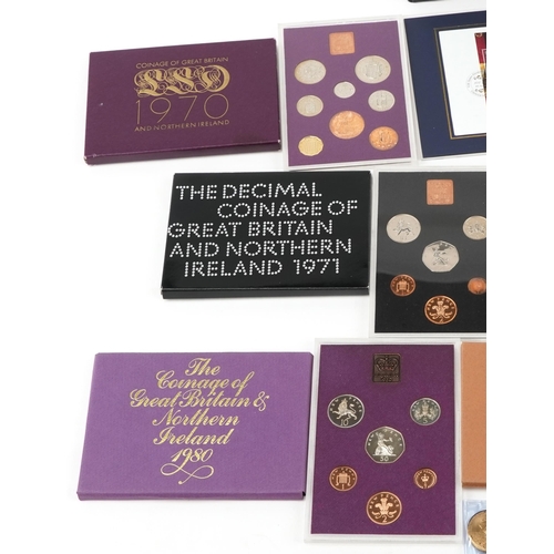 2174 - Boxed proof coin sets including 1970 Northern Ireland, five pound coin and a coin album containing 1... 