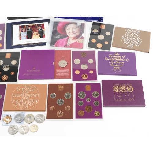 2174 - Boxed proof coin sets including 1970 Northern Ireland, five pound coin and a coin album containing 1... 