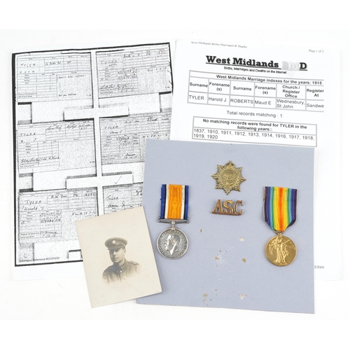 2501 - British military World War I medal pair with cap badges and photograph awarded to 161690 PTE.H.J.TYL... 