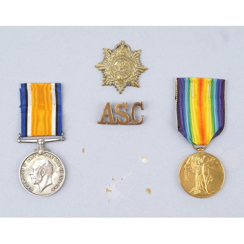 2501 - British military World War I medal pair with cap badges and photograph awarded to 161690 PTE.H.J.TYL... 