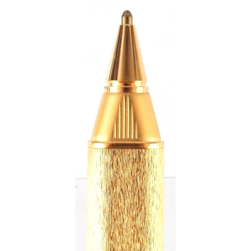 175 - Les Must de Cartier, gold plated bark design ballpoint pen with box and certificate numbered 373911