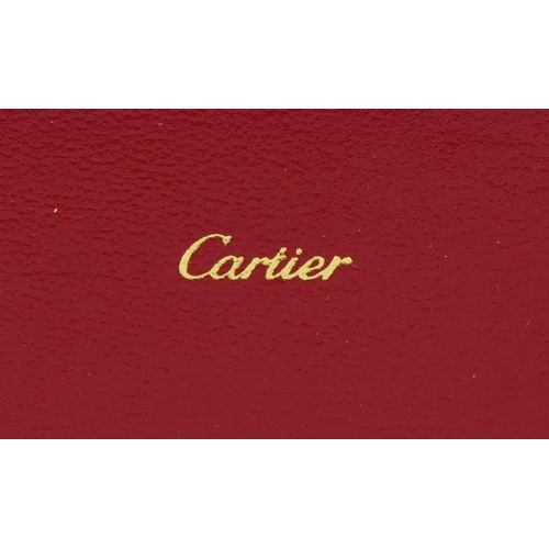 175 - Les Must de Cartier, gold plated bark design ballpoint pen with box and certificate numbered 373911