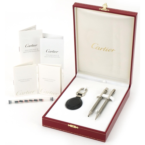 172 - Cartier, boxed set - ballpoint pen, propelling pencil and key chain