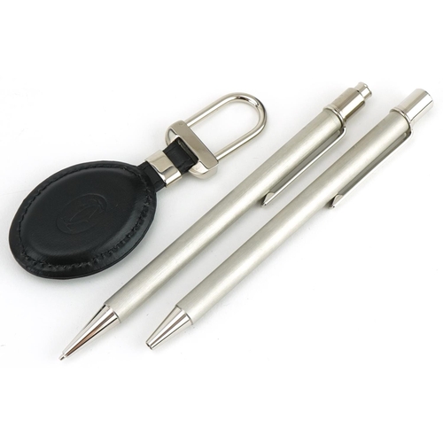 172 - Cartier, boxed set - ballpoint pen, propelling pencil and key chain