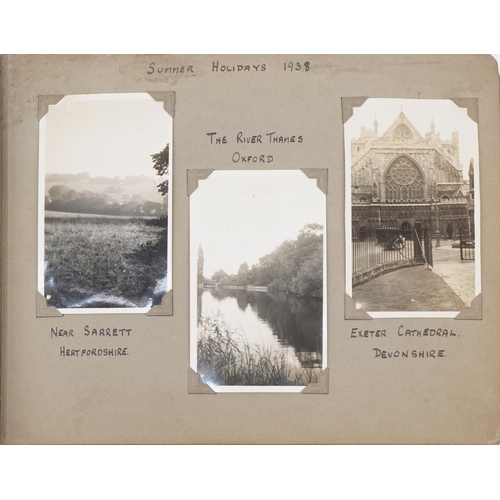 2431 - Early 20th century and later postcards and photographs, some military, arranged in two albums includ... 