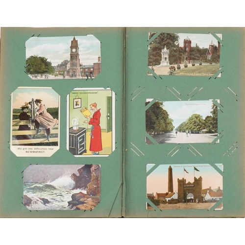 2438 - Early 20th century and later postcards and greetings cards arranged in two albums including Eastbour... 