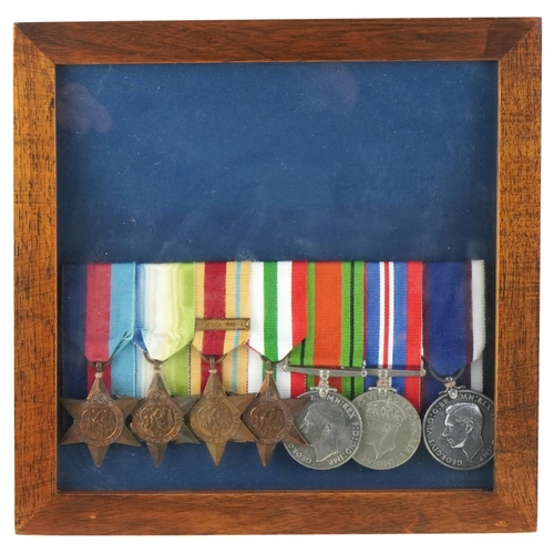 2517 - British military World War II medal group with bar including Royal Naval Good Conduct medal awarded ... 