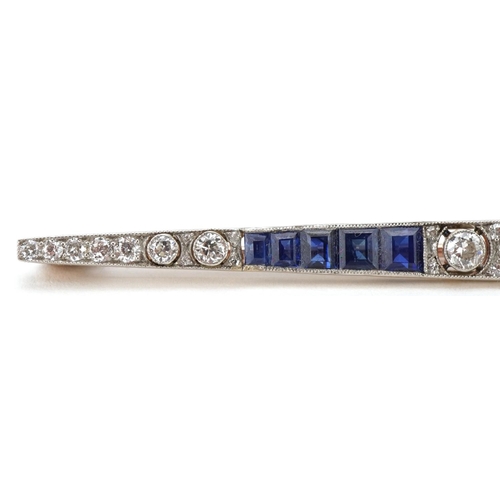 3001 - Art Deco gold, diamond and sapphire bar brooch, the three brilliant cut central diamonds intersperse... 