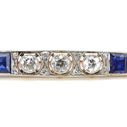 3001 - Art Deco gold, diamond and sapphire bar brooch, the three brilliant cut central diamonds intersperse... 