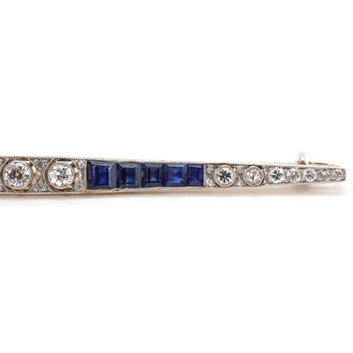  Art Deco gold, diamond and sapphire bar brooch, the three brilliant cut central diamonds intersperse... 