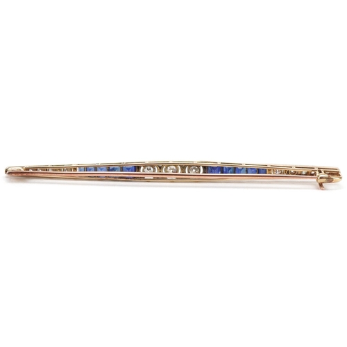  Art Deco gold, diamond and sapphire bar brooch, the three brilliant cut central diamonds intersperse... 