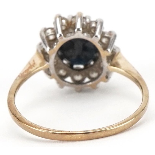 3126 - 9ct gold, sapphire and diamond cluster ring, the central sapphire approximately 9mm x 7mm, size M, 2... 